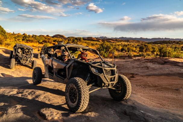 A Can-Am X3 Turbo ascending the slcikrock on Hell's Revenge