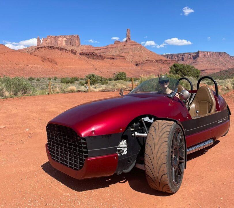 Vanderhall Rental in front of Castelton Tower near Moab Utah