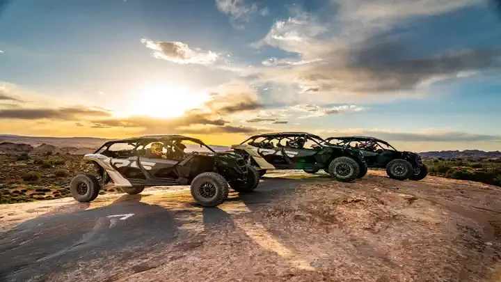 Can-Am Maverick X3 Model UTVs on Hell's Revenge trail in Moab Utah. Guests have a great time 